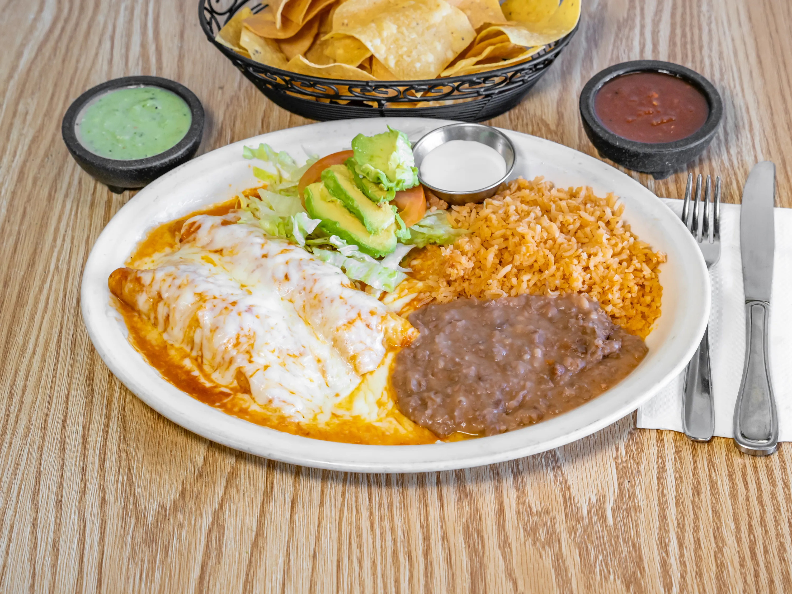 Red enchiladas plate at Taqueria Los Potrillos